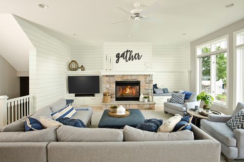 Timeless Farmhouse White Shiplap Family Room with fireplace and couches