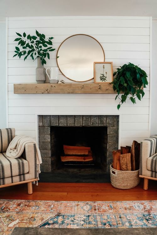 Smooth white shiplap around fireplace