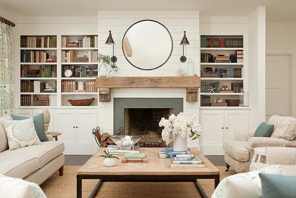 Smooth white shiplap fireplace in white room with gray tile around 