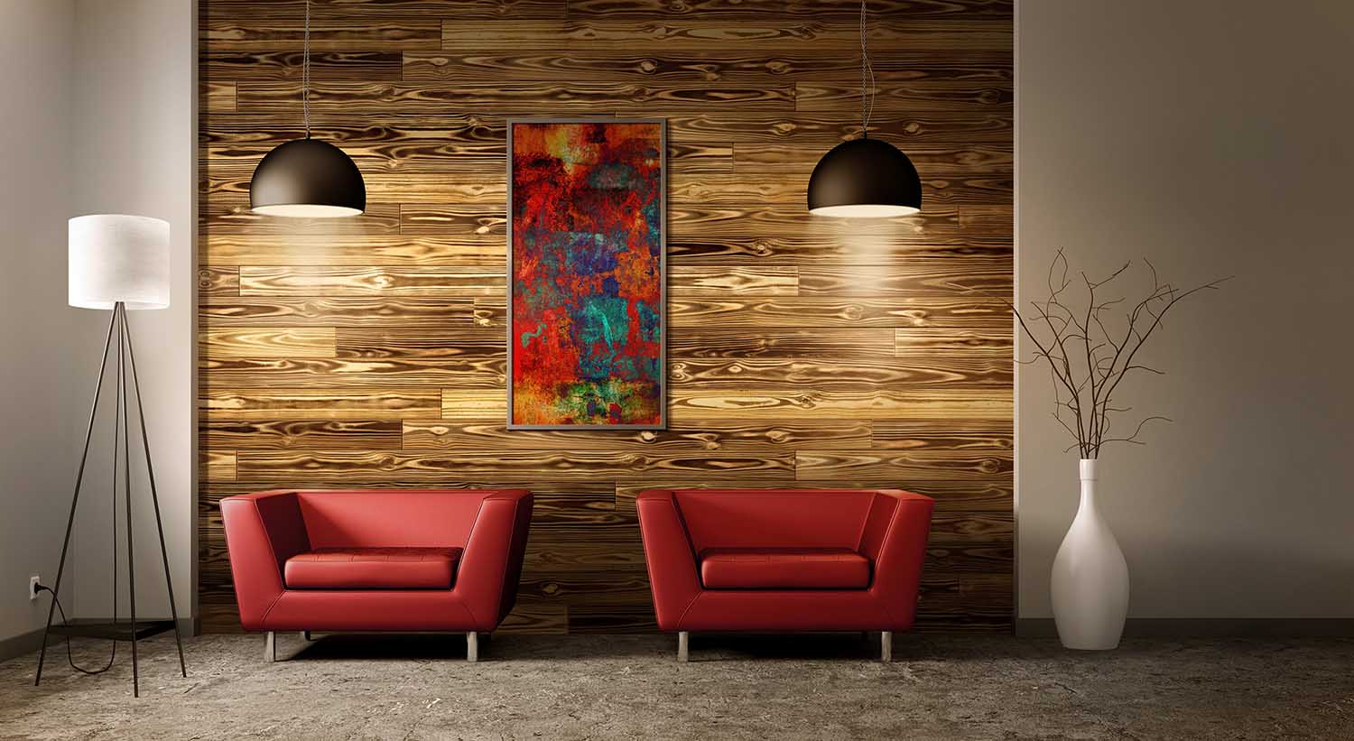 Charred Wood on accent wall with red chairs 