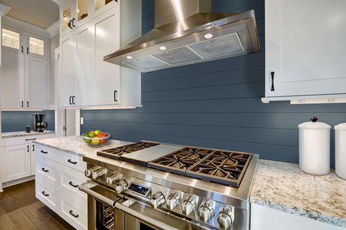 Timeless Cavalry Blue shiplap on kitchen backsplash 