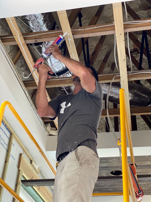 Use liquid nails to secure the shiplap bond.