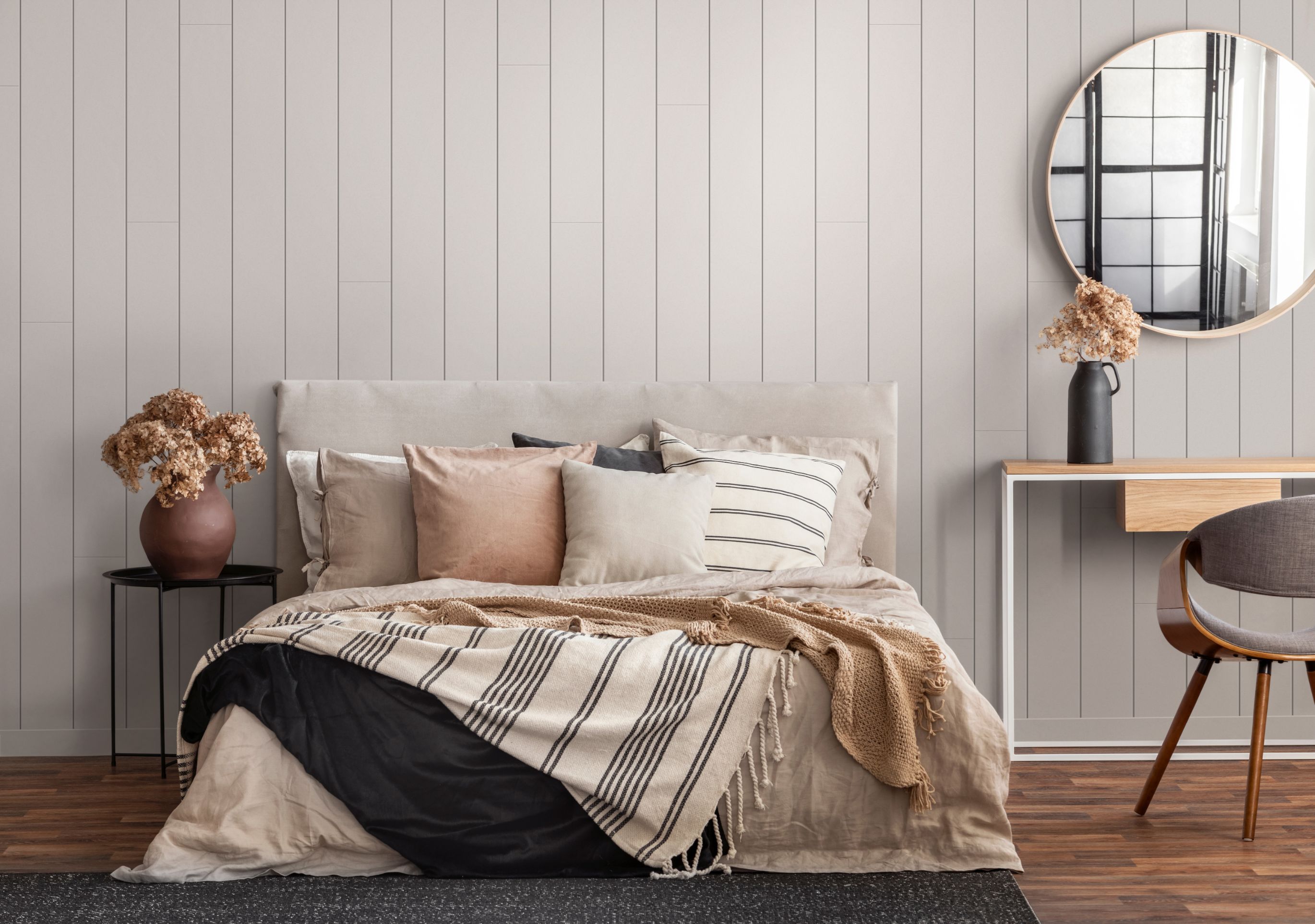 Timeless primed shiplap painted greige in bedroom