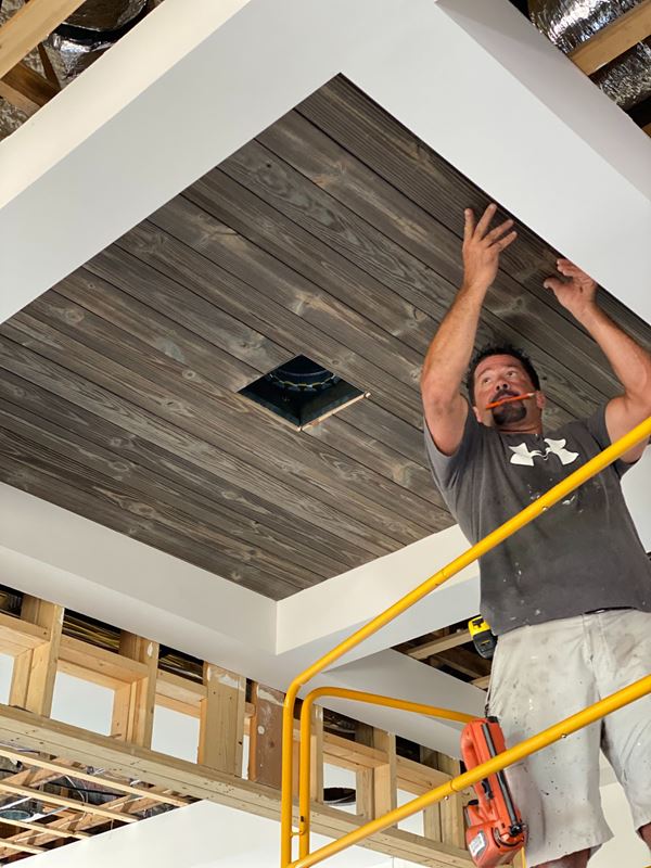 UFP-Edge Charred Wood shiplap install on great room ceiling studs in Palm Grove Farmhouse