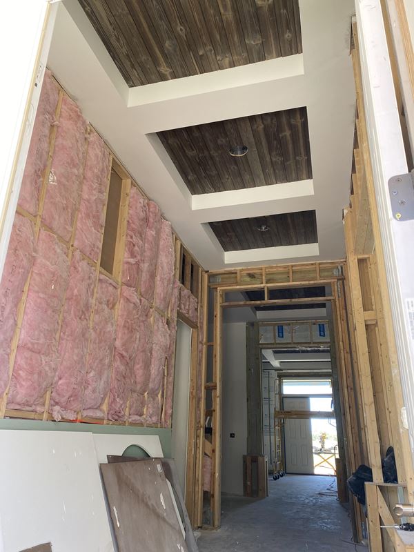 UFP-Edge Charred Wood Ash Gray shiplap in ceiling inlays in foyer area