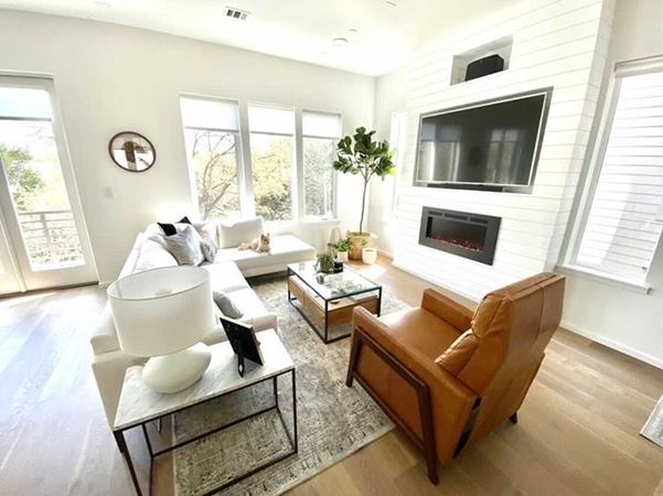 Living Room with shiplap fireplace and tv built-ins