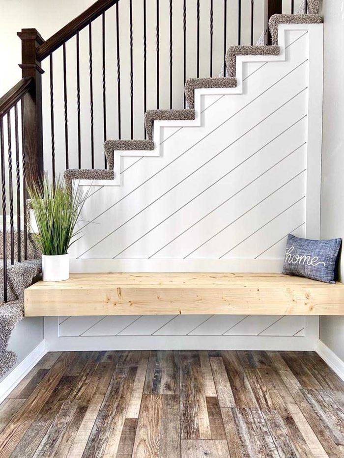 Timeless Farmhouse White shiplap diagonal wall stair landing bench