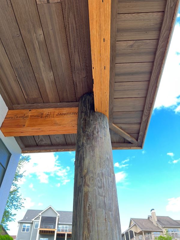 Closeup image of boat dock covered ceiling corner featuring Thermally Modified Wood Collection in Back Country