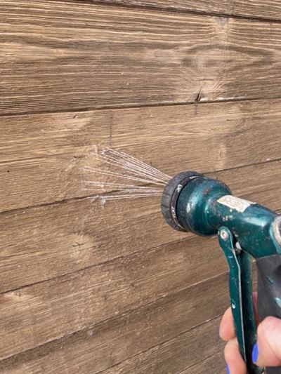 Demonstrating how to wash thermally modified wood collection siding