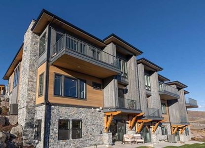 Modern condo building with thermally modified wood collection VG Hemlock and Big Sky cladding