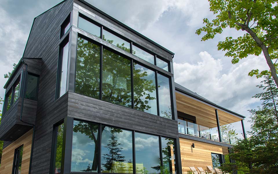 Modern forest home with UFP-Edge Thermally Modified Timber Ridge and Natural wood siding 