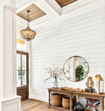Modern Farmhouse entryway with smooth white Timeless shiplap wall, beaded chandelier, and entry table 