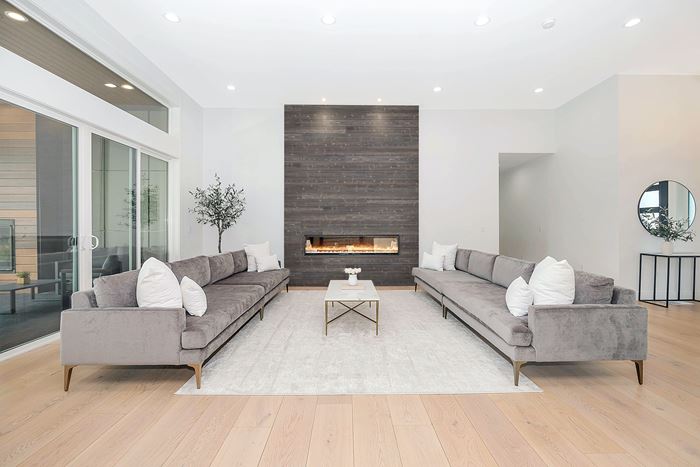 Modern living room and fireplace with UFP-Edge ash gray charred wood shiplap