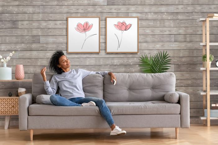 Charred Wood Smoke White shiplap with woman on sofa