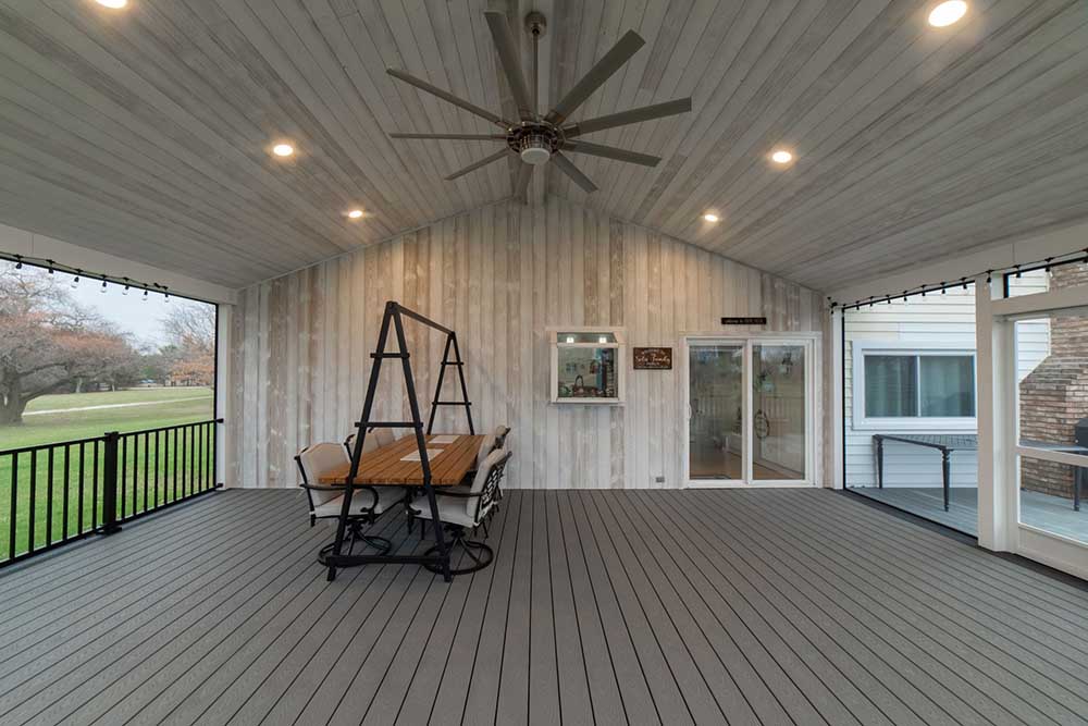 Covered porch with UFP-Edge glacier white thermally modified wood collection shiplap ceiling application