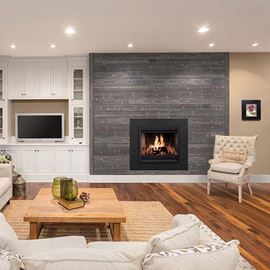 Living room fireplace with ash gray charred wood accent wall