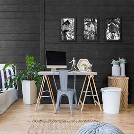 Home office featuring charcoal black rustic shiplap accent wall