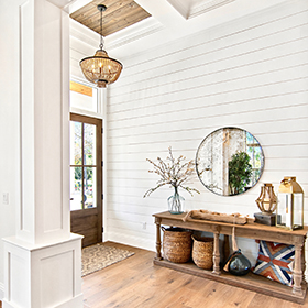 Modern home walkway with white timeless shiplap accent wall