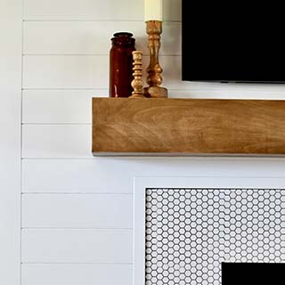 Fireplace close up with UFP-Edge farmhouse white timeless shiplap wall