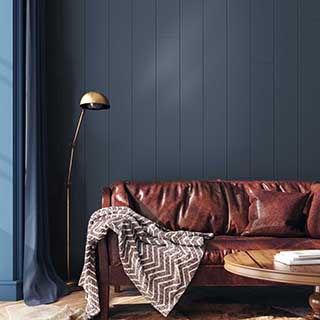 Leather sofa with UFP-Edge cavalry blue timeless shiplap wall