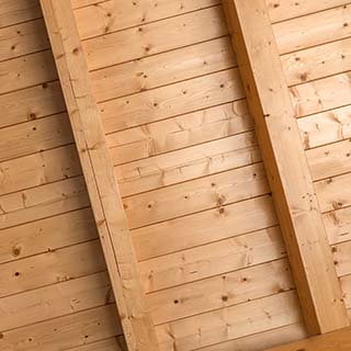 T&G pattern on covered porch ceiling with beams 