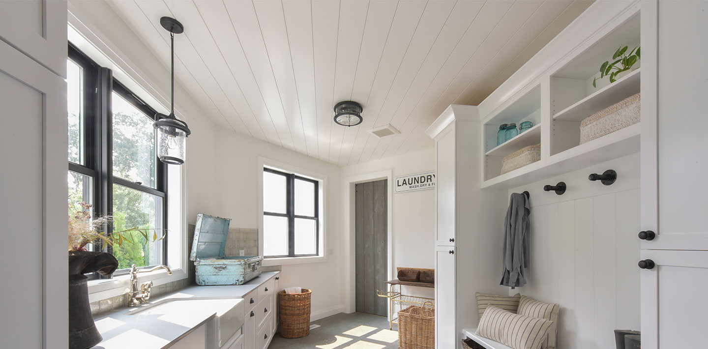 UFP-Edge farmhouse white timeless nickel gap shiplap laundry room.