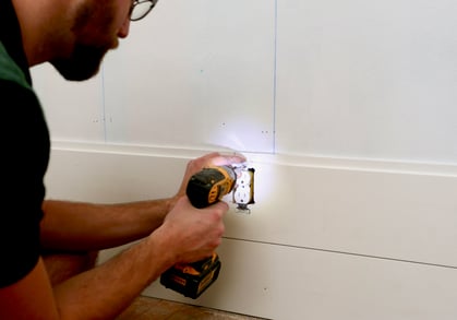 Screwing in outlet over shiplap board