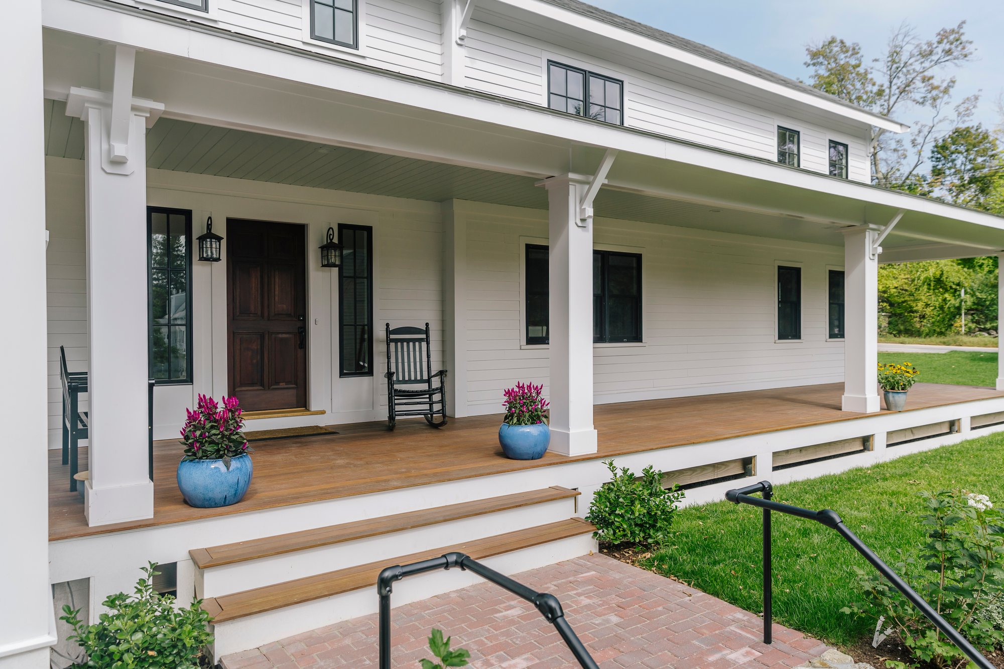 WhiteFarmhouseExteriorPatternSidingTrim